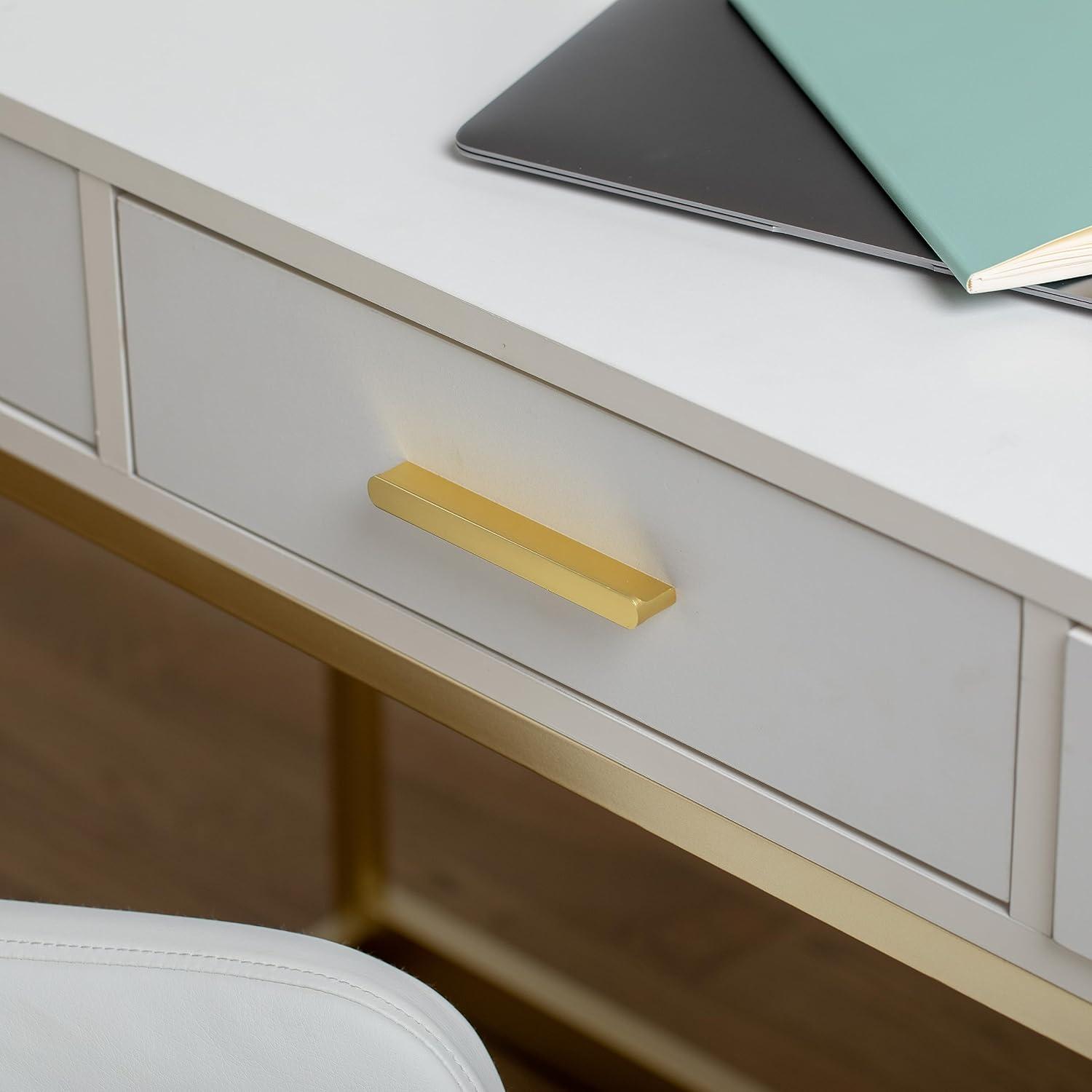 imageMartha Stewart Ollie Home Office Desk with 3 Drawers in White with Polished Brass HardwareWhite TopPolished Brass Frame