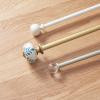 Martha Stewart Roseland Curtain Rod Set for Windows 36”- 66”, 3/4 inch, Brushed Brass, Blue White Finials