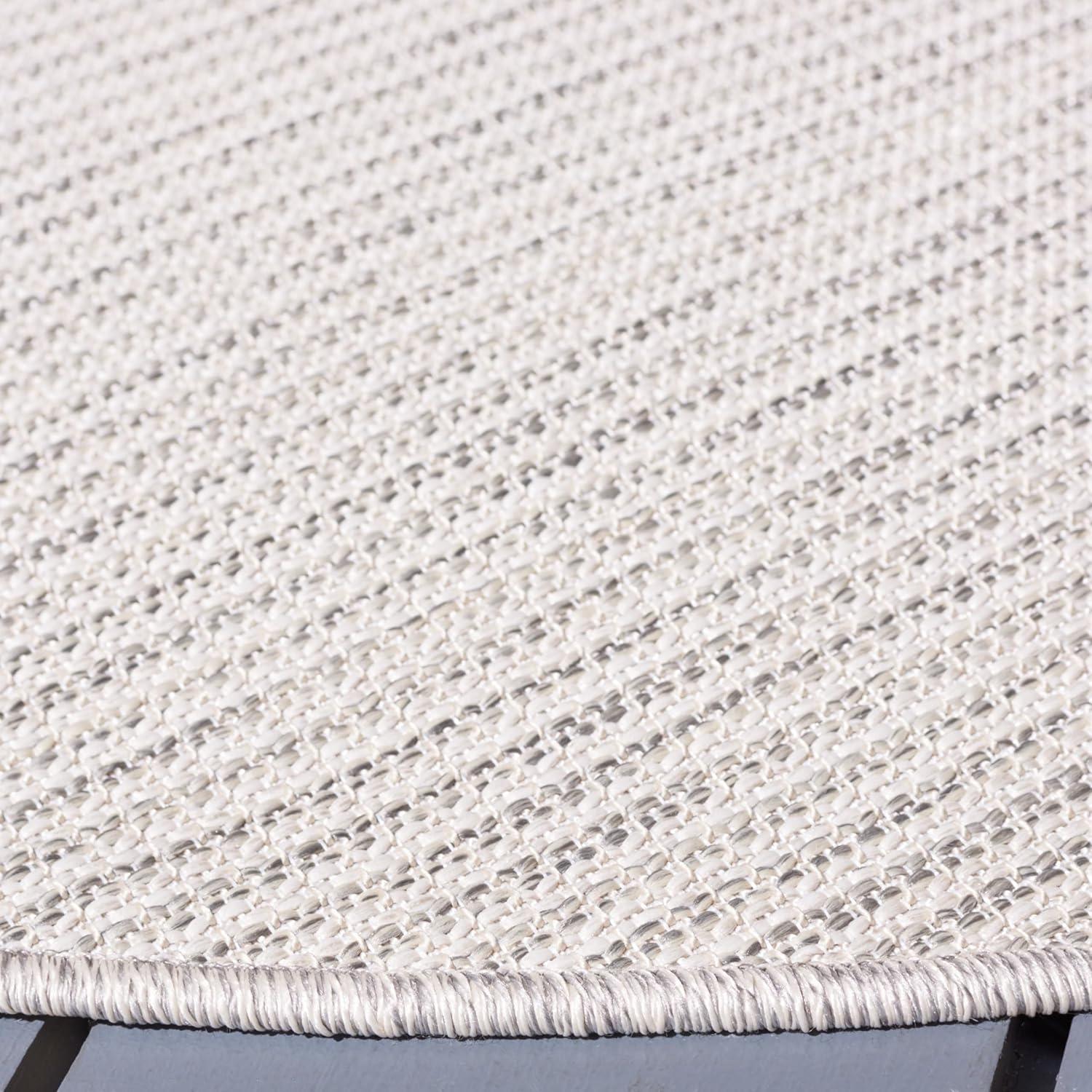 image:imageMartha Stewart x SAFAVIEH Outdoor Area Rug Collection 65 Round Navy Weather Resistant amp Washable Ideal for Patio Backyard Mudroom Deck Dining Space MSR4490NIvory