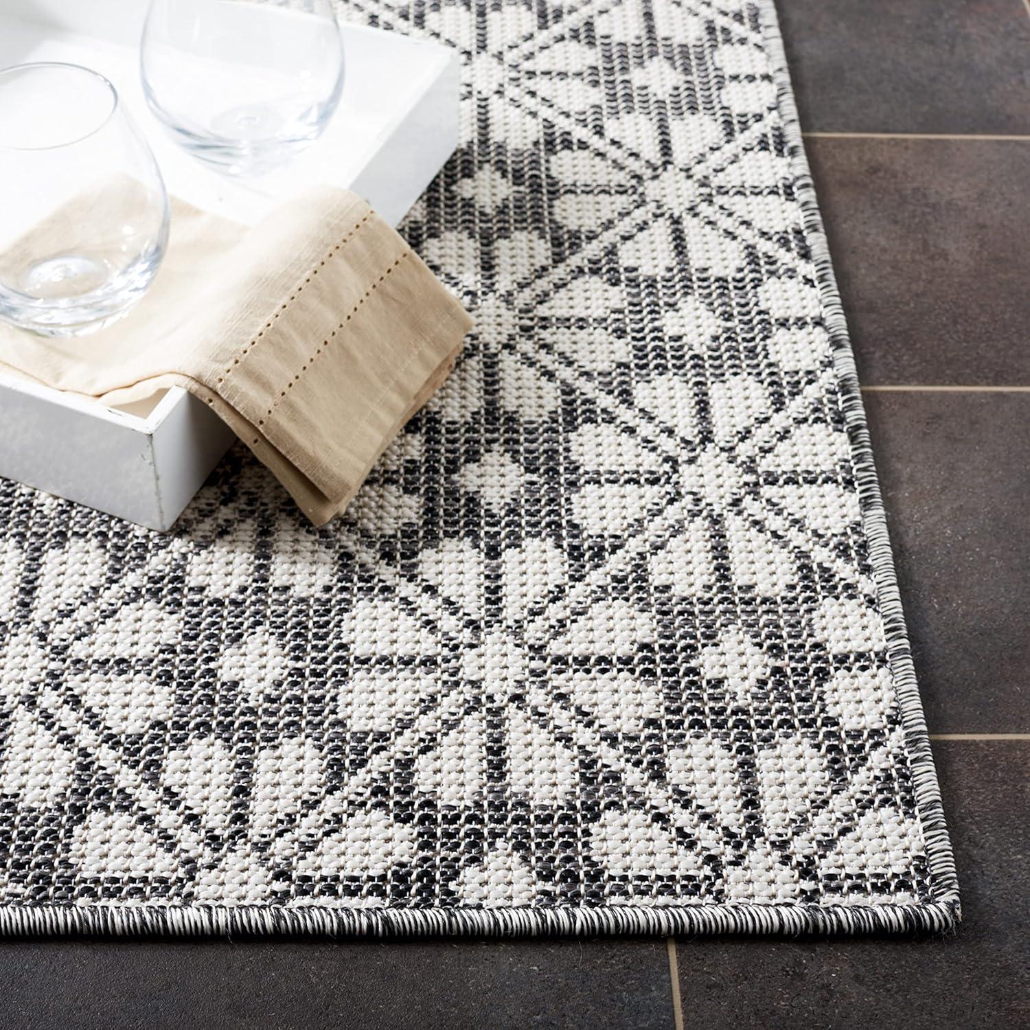 image:imageMartha Stewart x SAFAVIEH Outdoor Area Rug Collection 8 x 10 Black Weather Resistant amp Washable Ideal for Patio Backyard Mudroom Deck Dining Space MSR4491Z