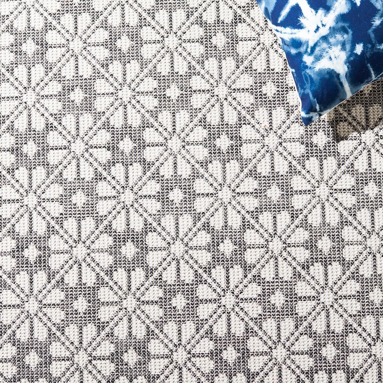 image:imageMartha Stewart x SAFAVIEH Outdoor Area Rug Collection 8 x 10 Black Weather Resistant amp Washable Ideal for Patio Backyard Mudroom Deck Dining Space MSR4491Z