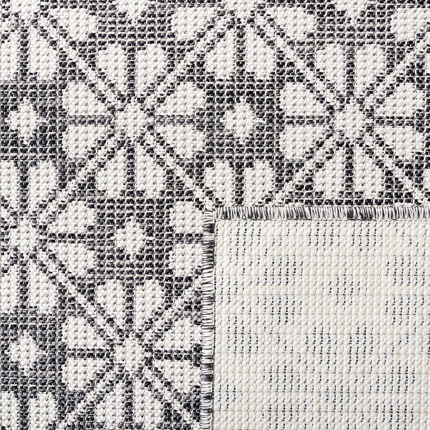image:imageMartha Stewart x SAFAVIEH Outdoor Area Rug Collection 8 x 10 Black Weather Resistant amp Washable Ideal for Patio Backyard Mudroom Deck Dining Space MSR4491Z